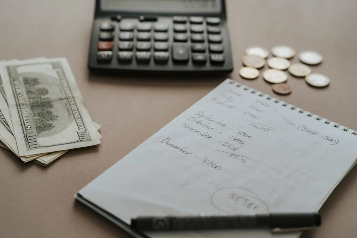 Christmas gift spending being planned in a notebook