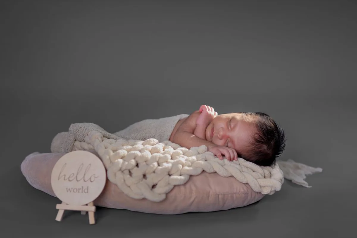A neutral welcome gift prepared for new parents